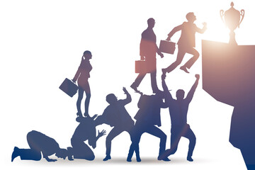 Career progression concept with businessman climbing stairs
