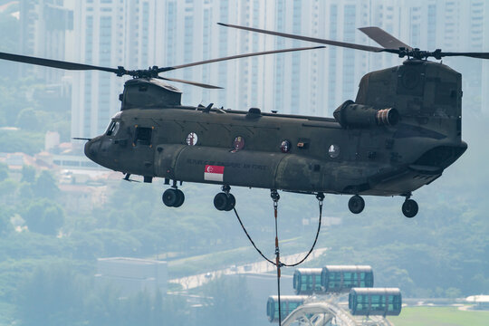 Singapore - July 2020: State Flag flypast by RSAF helicopters for NDP at Singapore.	