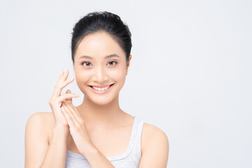 Beautiful female asian face with natural perfect skin in studio portrait