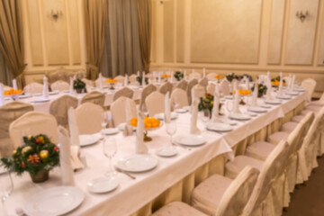 Blurs background interior of the cafe, restaurant, bistro without visitors as an advertising background