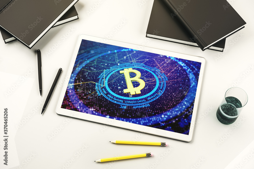 Poster top view of modern digital tablet screen with creative bitcoin symbol hologram. mining and blockchai