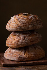 Freshly baked sourdough bread with floral decoration on it 