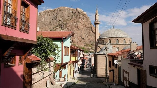 Street with traditional turkish ottoman houses in Afyonkarahisar city, Turkey