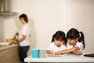 Covid-19 Coronavirus and Learning from home, Home school kid concept. Little children study online learning from home with laptop.