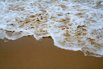 The beautiful sand and water flow of Bondi Beach in Sydney, Australia.  A very famous beach.
