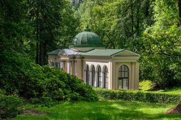 Fototapeta premium Pavilion of Forest mineral water spring - summer time in Czech spa city Marianske Lazne (Marienbad) - Czech Republic