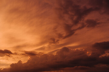 Beautiful sky with orange clouds in sky at sunset . Natural background.