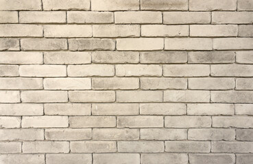 Wall of grey color clay brick texture in background