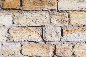 Stone wall background. Background of stone wall of boulders and pebbles