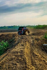 Tractor On The Field.