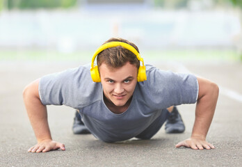 Sporty young man training outdoors