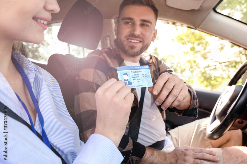 Poster Man getting driver licence after passing test