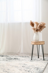 Interior of modern room with soft carpet