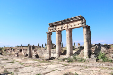 Fototapeta na wymiar Columns on Frontinus street, Hierapolis, Pamukkale, Turkey