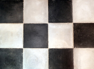 Old porcelain checkered tiles floor texture