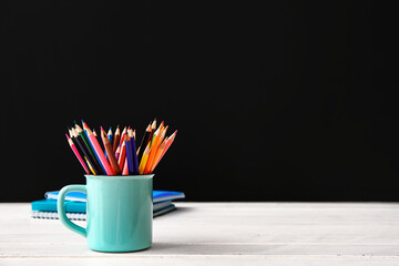 Set of pencils on table