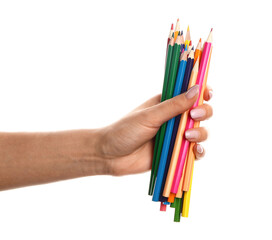 Naklejka premium Hand with colorful pencils on white background