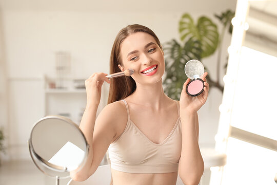 Young Woman Doing Makeup At Home