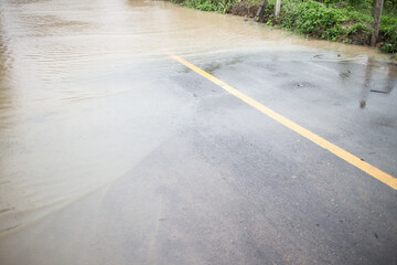 Flooding on the  asphalt  road