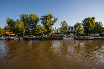 Obraz premium Wroclaw, Poland August 5, 2020; View of the city of Wroclaw from the perspective of the Odra River.