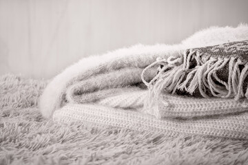 Cozy home, warm knitted wool clothes.