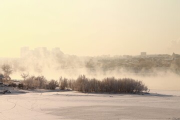 Obraz na płótnie Canvas winter city on the river