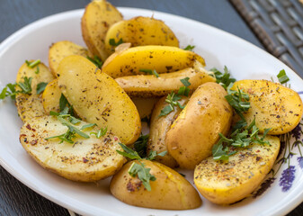  potatoes with herbs sprinkled with green parsley