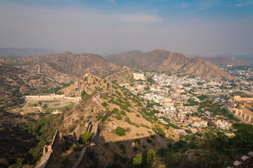 Bird's eye view of the city of Jaipur in Rajasthan, the vast and long high wall over the range of the Aravalli mountains