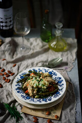 Chicken breast with vegetables and almond.