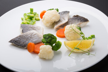 Steamed white fish fillet with vegetables