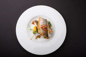 Fried fish fillet with spinach