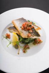 Fried fish fillet with spinach