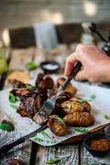 pork ribs with potatoes.selective focus.style rustic.