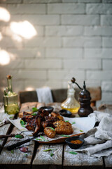 pork ribs with potatoes.selective focus.style rustic.