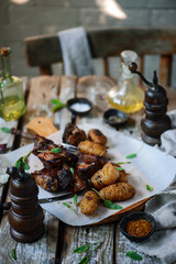 pork ribs with potatoes.selective focus.style rustic.