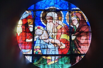 Polychrome stained glass windows in the cathedral of Florence, Italy