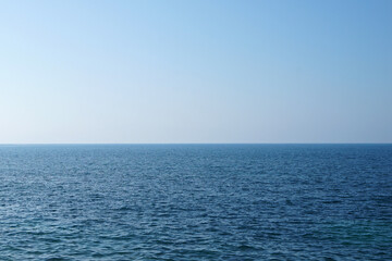 Fototapeta premium Natural landscape of infinity deep blue ocean with cloudy sky