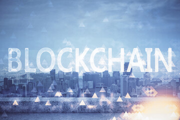 Double exposure of crypto currency theme hologram drawing and city veiw background. Concept of blockchain and bitcoin.