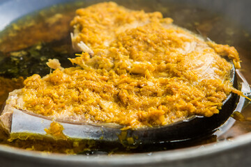 Steaming fish in pot , in door  Chiangmai  Thailand