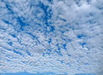 Beautiful background of white cloud cover on blue sky