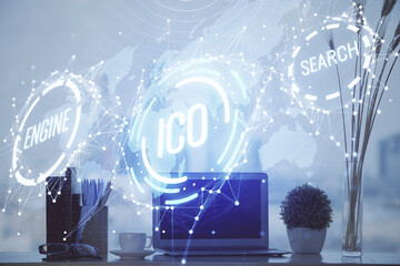 Double exposure of blockchain and crypto economy theme hologram and table with computer background....
