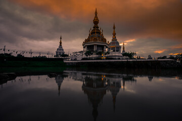 Fototapeta premium The background of an important tourist attraction in Khon Kaen Province (Wat Thung Setthi) is a large pagoda in the middle of a swamp, tourists always come to see the beauty in Thailand