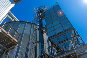 Fototapeta premium Agricultural Silo - building for storage and drying of grain crops.