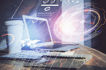 Double exposure of desktop computer and technology theme hologram. Concept of software development.