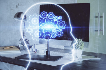 Multi exposure of work table with computer and brain hologram. Brainstorm concept.