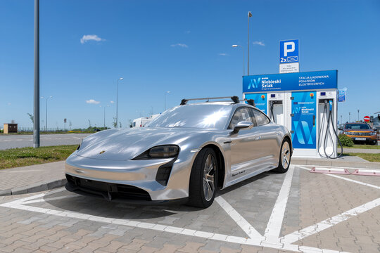 Porsche Taycan Electric Supercar At The Charging Station Belonging To The Polish Lotos Company
