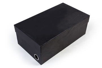 Closed black cardboard shoe box on a white background