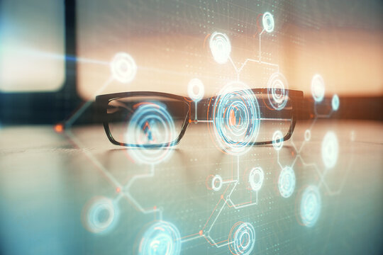 Data tech hologram with glasses on the table background. Concept of technology. Double exposure.