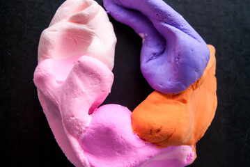 Multi-colored modeling dough. Children's creativity for development.