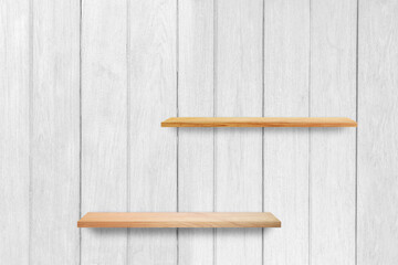 Empty wood shelf on white wooden wall texture background.